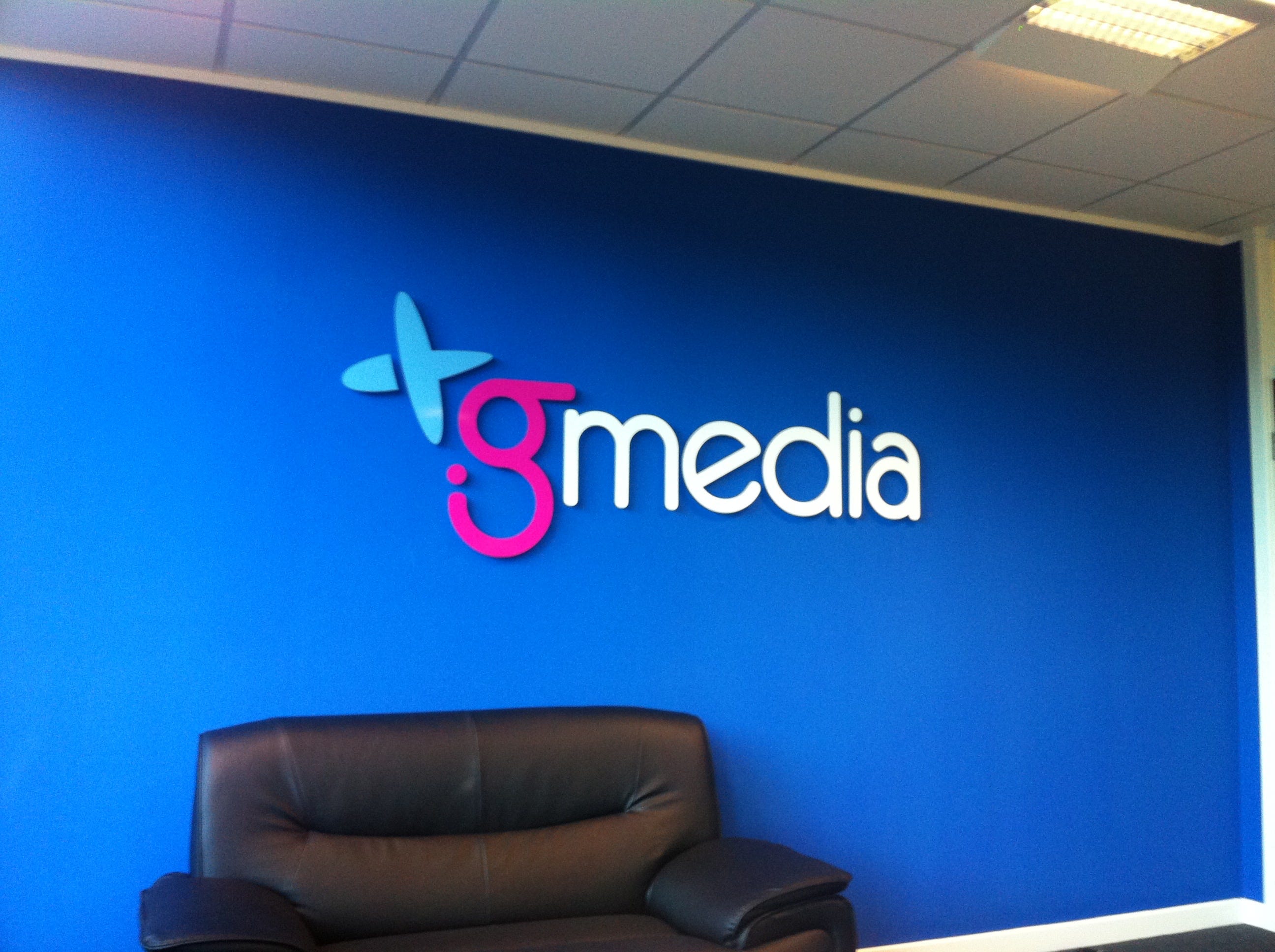 The first G Media office and our famous blue wall and sign